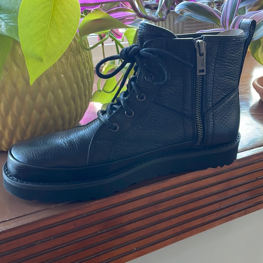 Ugg black leather booties!  Brand new condition,without tags Size 8 side zipper